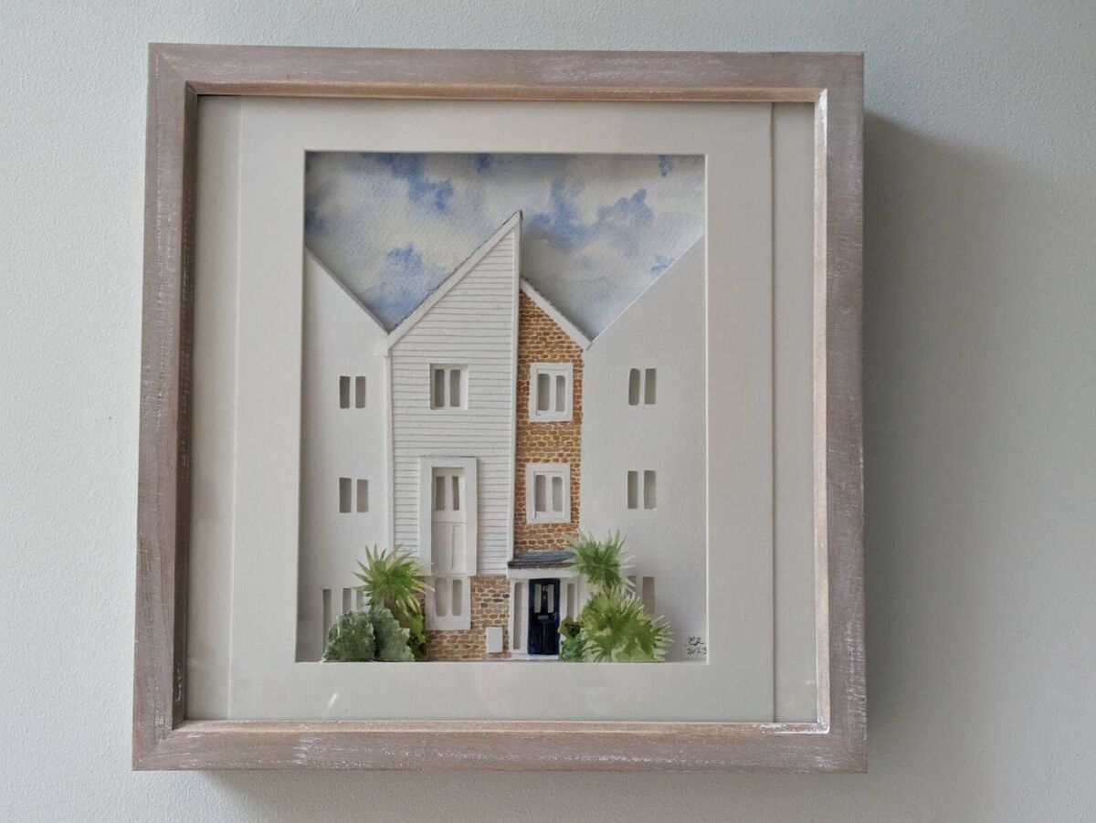 3D paper-sculpted townhouse portrait in a limed wood frame